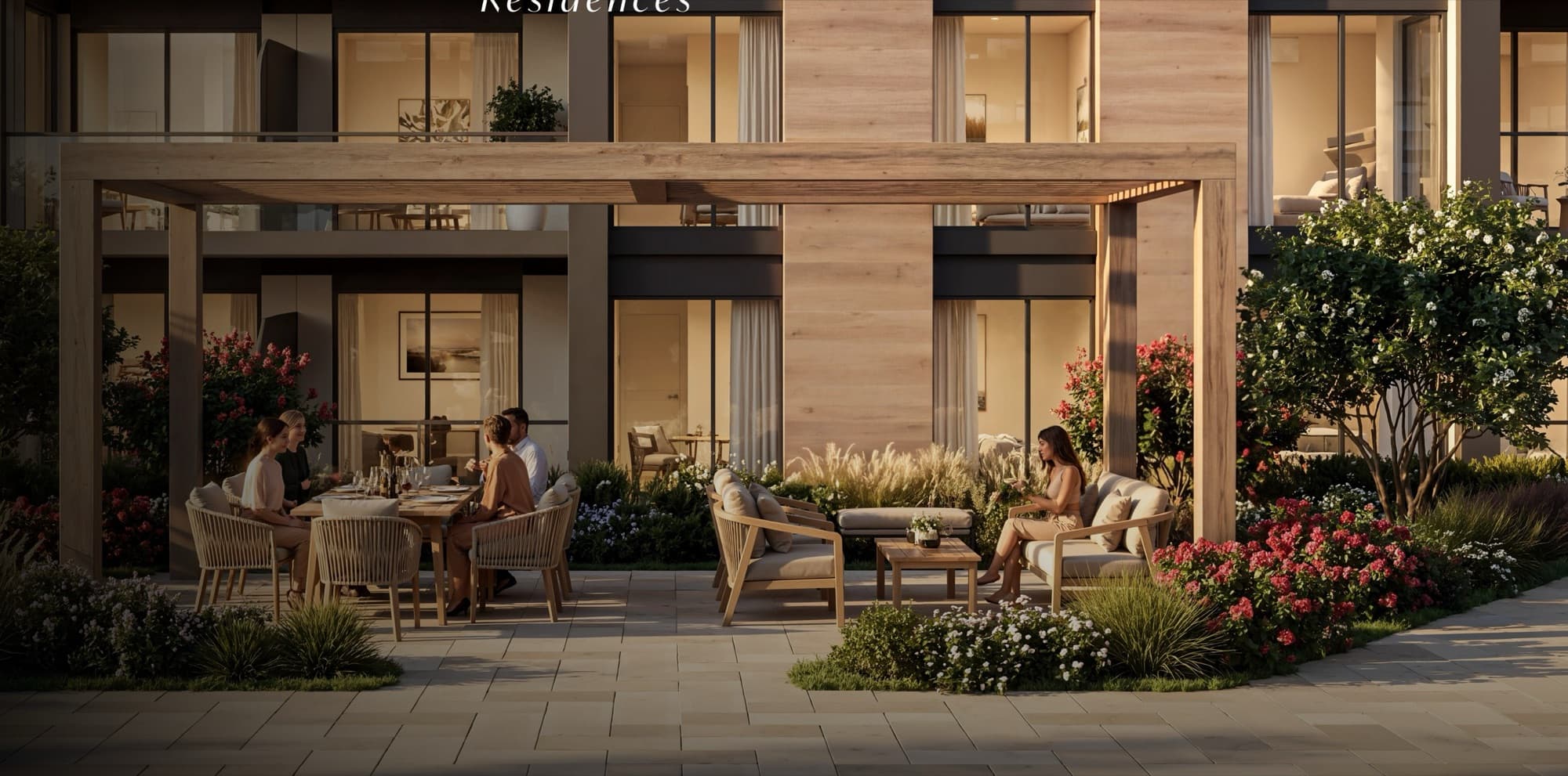 The Woods — residences over the landscaped courtyard at dusk
